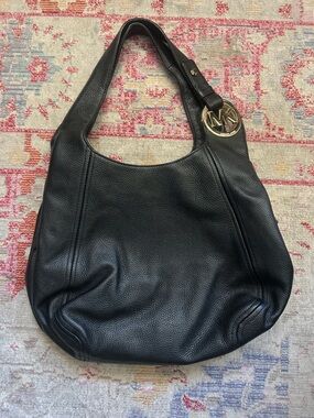 Michael Kors Black Pebbled Leather Hobo with Gold MK Charm